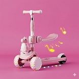 SCOOTER CON ASIENTO MODELO »DINOSAURIO« MUSICAL Y LUCES